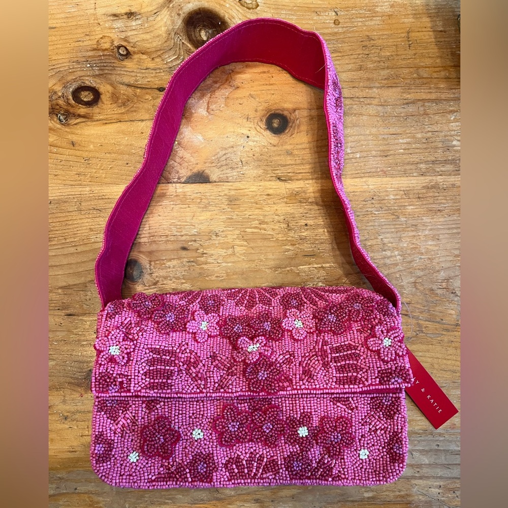 Beautiful pink and red beaded handbag. 9”x 5” x 2.5”. Kelly & Katie